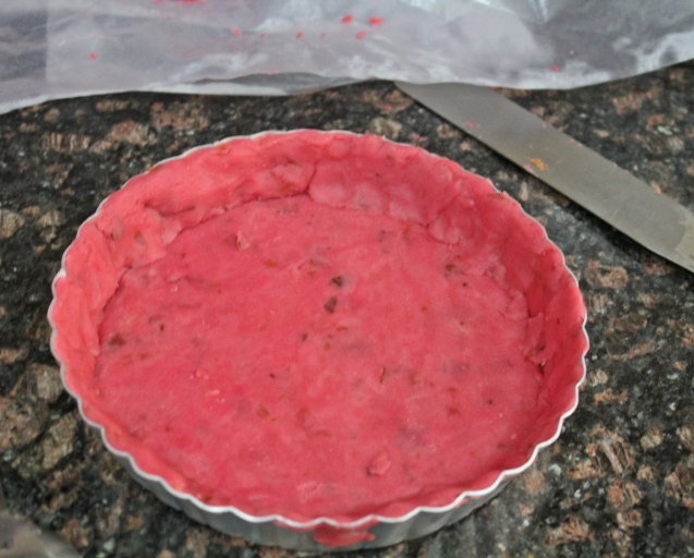 pie dough pressed into the tart pan